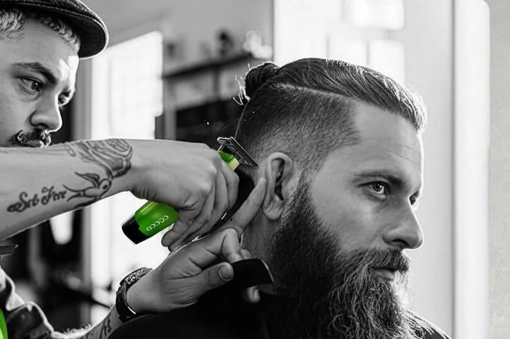 Barber using a Cocco trimmer to edge up a crisp lineup